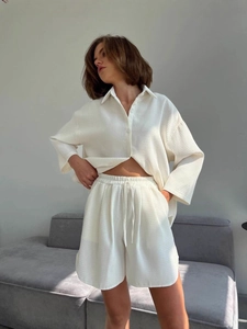 Women's 2-piece waffle knit lounge set with long sleeve shirt and elastic shorts