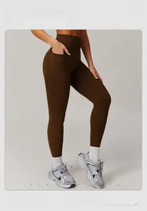 Detail view of high-waisted yoga leggings with side pockets and soft brushed texture