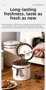 White stainless steel coffee canister with airtight lock and CO2 release valve detail