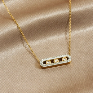 Elegant gold plated stainless steel paperclip necklace with sliding white zircon stones