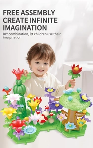 Close-up of children's hands assembling colorful DIY flower garden building blocks set