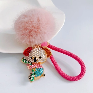 Cute koala keychain with colorful rhinestones, pink faux fur pompom and woven strap