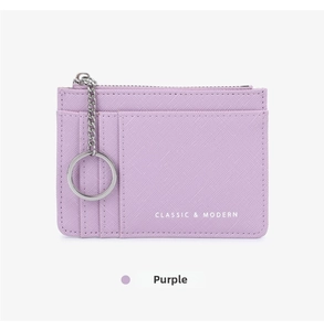 Detail of light purple cross-grain leather coin purse with card slots and key ring