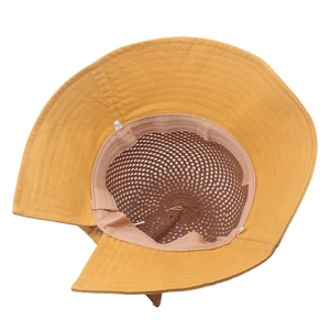 Detail view of the yellow sun hat showing the mesh breathable lining and sweatband