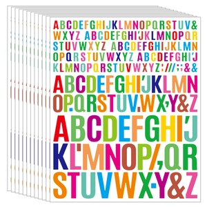 Macro detail of colorful alphabet stickers for scrapbooking and holiday card decorating
