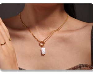 Double-layered 18k gold plated necklace with a white rectangular baroque pearl pendant