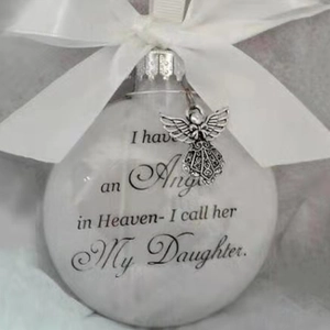 Detail view of white Christmas feather ball ornament with My Daughter tribute text