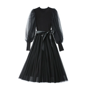 Elegant black long sleeve dress with knit top, polka dot mesh sleeves and mesh skirt