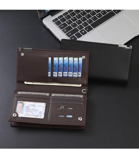 Detail of brown and black long wallets showing multiple card slots and leather texture