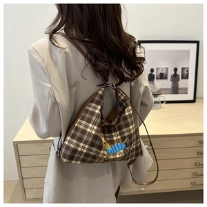 Brown plaid tote bag featuring a cute blue cartoon dog embroidery on a casual shoulder bag