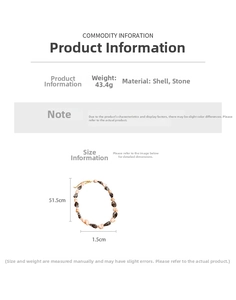 Détail du collier de perles montrant le poids de 43,4g et la longueur de 51,5cm