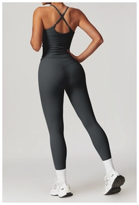 Close-up of the cross-back strap design on a dark gray yoga vest with high elasticity