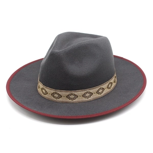 Dark grey wool fedora hat with red trim and golden embroidered geometric band