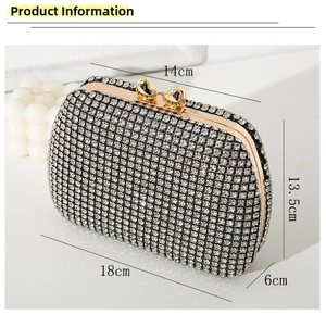 Detail view of silver rhinestone evening clutch with heart clasp and size measurements