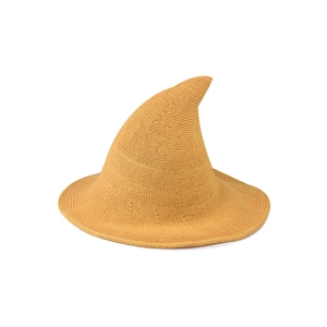 Detail of ginger yellow knitted witch hat showing high-quality woven fabric and pointed design