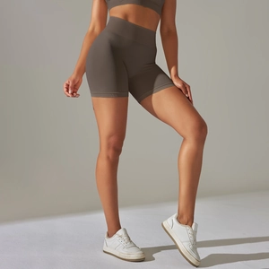 Detailed close-up of dark taupe seamless high waist yoga shorts with ribbed waistband