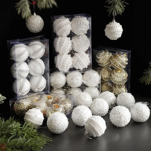 Elegant Christmas tree ornament set featuring pearl and glitter textures on luxury baubles