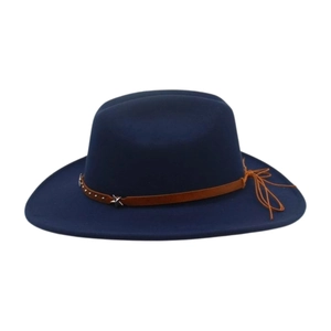 Detail of navy felt fedora featuring a brown leather band with silver star-shaped metal studs