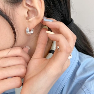 Minimalist 925 sterling silver multilayered hoop earrings in a geometric industrial style