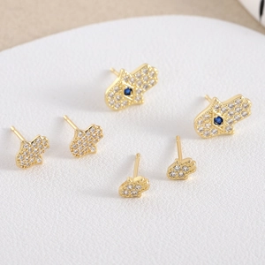 Exquisite Hamsa Hand stud earrings with blue zirconia and sparkling gold plating