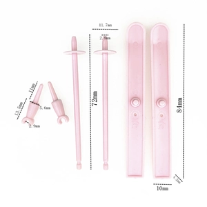 Detailed technical diagram showing dimensions of pink plastic toy sled assembly components