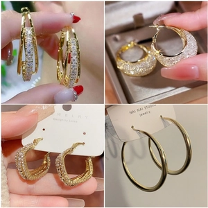 Luxurious gold-plated hoop earrings with sparkling cubic zirconia in four elegant styles