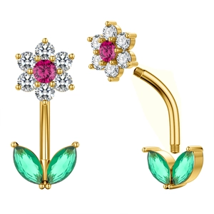 Macro detail of a floral belly button ring with pink zircons and gold plated finish
