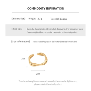 Macro detail of 18k gold plated wavy copper ring with technical product dimensions