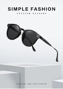 Detail of vintage round polarized sunglasses with silver rivets on a minimalist stone base
