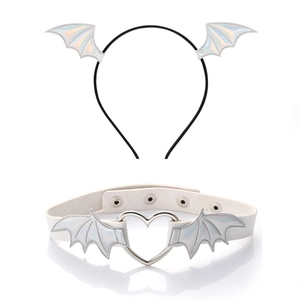 Detail of adjustable choker with metal heart buckle and iridescent bat wings accessories