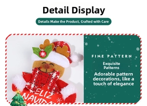 Detail of red knit reindeer Christmas tag with Feliz Navidad text and snowflake patterns