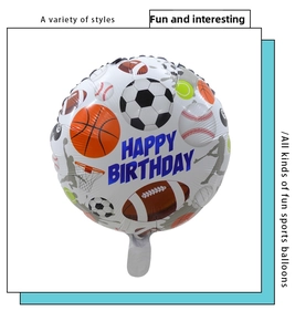 Detail of sports theme birthday foil balloon with football basketball and tennis patterns