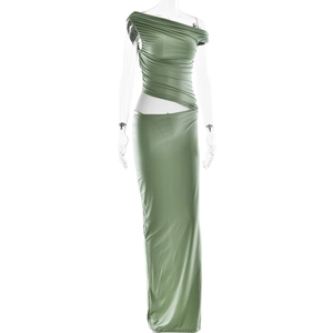 Detail of green one-shoulder maxi dress featuring waist cut-out and ruched mesh texture