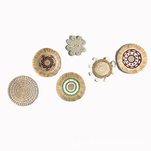 Detailed close-up of 6-piece bohemian handmade woven straw wall hanging ornaments