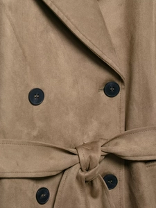 Detail shot of brown faux suede trench coat texture with double-breasted buttons and belt
