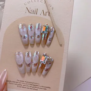 Sparkling opal press-on nails set with aurora sequins and large luxury rhinestones