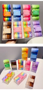 Detail of colorful high elasticity hair bands in transparent box with OOTD label