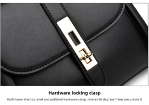 Detailed close-up of a golden rectangular metal lock on black textured leather bag