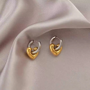 French vintage heart hoop earrings in 18K gold and silver two-tone finish on silk