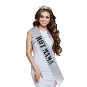 Silver satin sash with black HOT MAMA text worn over a white dress for parties