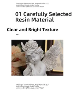 Close-up of matte white resin angel sculpture with detailed wings and floral wreath