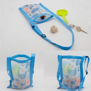 Detailed views of kids mesh beach bag with blue whale prints and adjustable strap