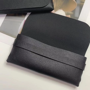 Minimalist black lychee texture leather glasses pouch with slim portable sleeve design