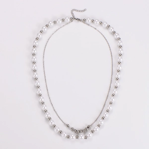 Elegant layered pearl necklace with silver beads and delicate choker chain for women
