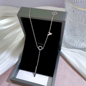 Silver Y-shaped LOVE letter necklace with bar pendant displayed in a premium gift box