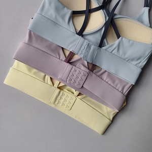 Detail view of high-elastic sports bra back with three-row hooks and breathable pads