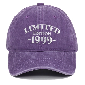 Front detail view of purple washed cotton baseball cap with Limited Edition 1999 embroidery