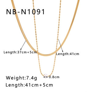 Close-up of dual-layer gold snake chain and bead necklace with 0.8cm pearl pendant