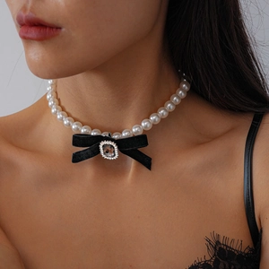 Elegant pearl necklace with black velvet bow and sparkling crystal pendant for women