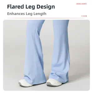 Detail of flared leg openings on light blue yoga pants for elongated leg visual effect